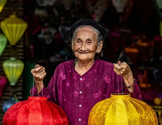 Hoi An lantern making class with tourists creating traditional lanterns