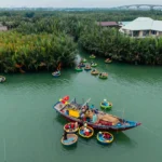 cam thanh coconut tour with basket boat in hoi an coconut forest