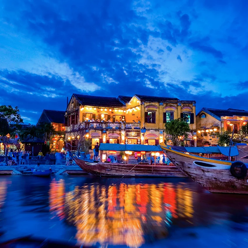 Hoi An sunset transitioning to night lantern lighting
