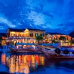 Hoi An at night with colorful lanterns lighting up the ancient town streets