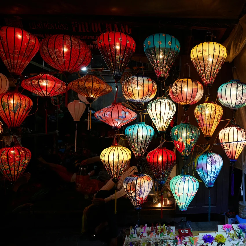 hoi an lantern street at night glowing lights